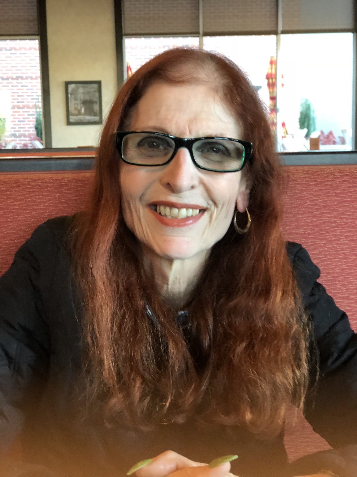 Karen J. Levine smiling and posing for a picture